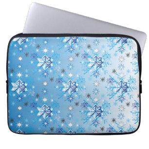 Intricate blue and white stars and snowflakes laptop sleeve