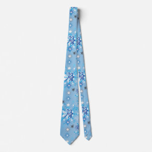 Intricate blue and white stars and snowflakes tie