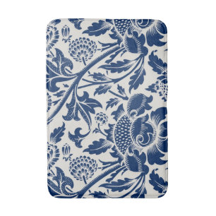Intricate blue floral pattern on light background bath mat