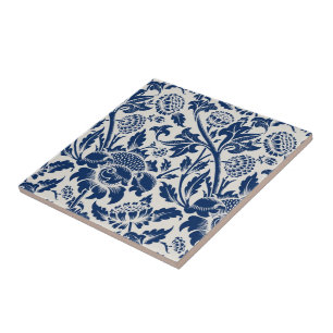 Intricate blue floral pattern on light background ceramic tile