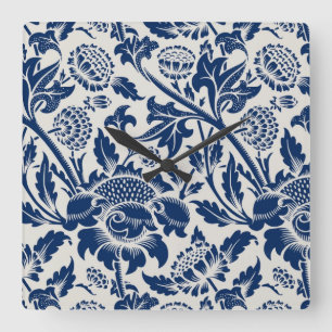 Intricate blue floral pattern on light background square wall clock