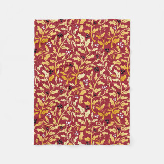 Intricate gold and red holly pattern fleece blanket