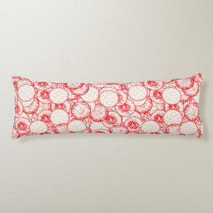 Intricate textile design featuring red, gold, and  body cushion