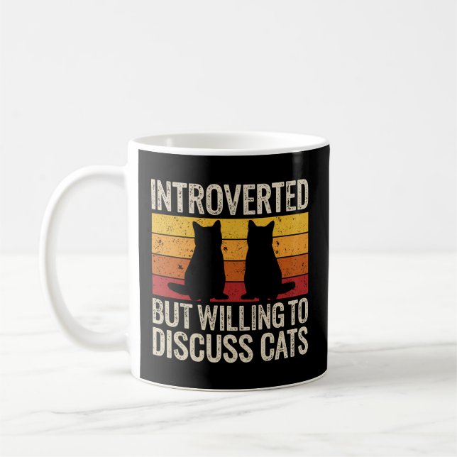 Introverted But Willing To Discuss Cats Introverts Coffee Mug (Left)