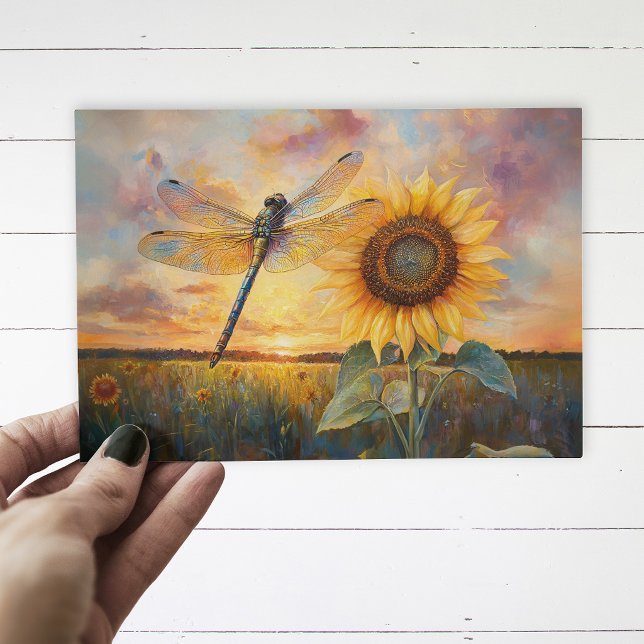 Iridescent Dragonfly Rustic Sunflower Postcard (Postcard with a dragonfly and a sunflower being held up by a hand, over a white wood background.)