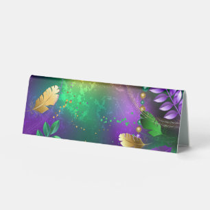 Iridescent mardi gras background with beads