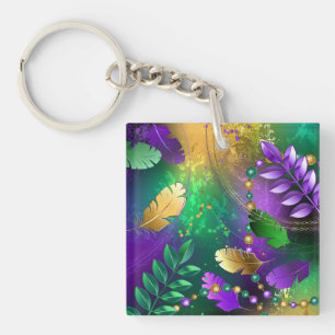 Iridescent mardi gras background with beads key ring
