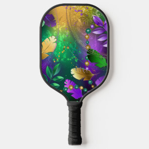 Iridescent mardi gras background with beads pickleball paddle