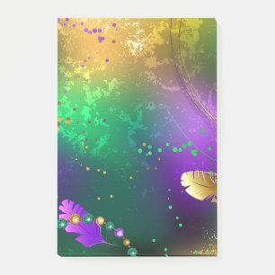 Iridescent mardi gras background with beads post-it notes