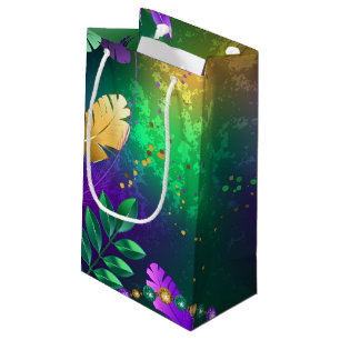 Iridescent mardi gras background with beads small gift bag