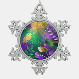 Iridescent mardi gras background with beads snowflake pewter christmas ornament