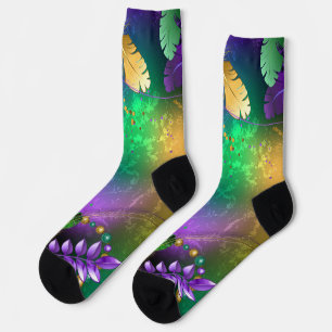 Iridescent mardi gras background with beads socks