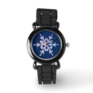 Iridescent snowflake on dark blue watch