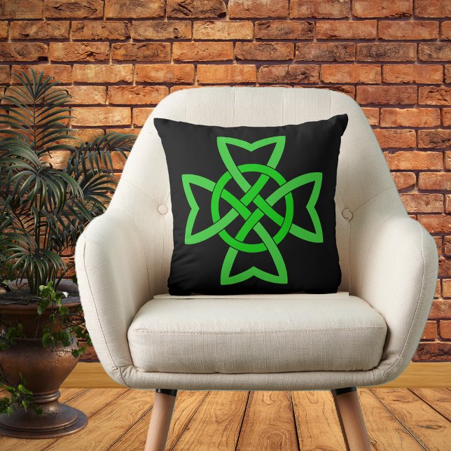 Irish Green Celtic Knot Cushion (Vibrant green Irish Celtic Knot on black decorative pillow.)
