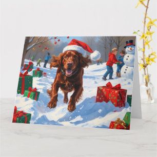 Irish Red Setter Running Snow with Christmas Hat Card