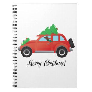 Irish Setter Driving a Car with a tree on top. Notebook