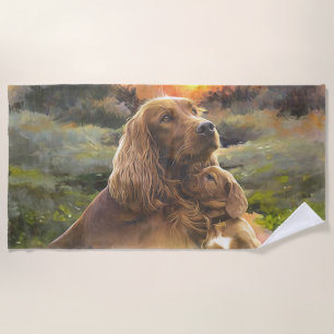 Irish setter with puppy beach towel