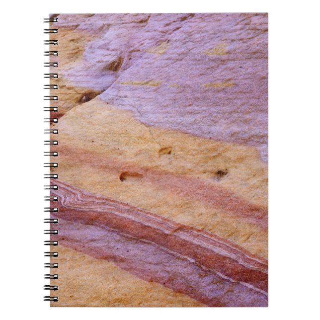 Iron oxides colour a sandstone formation notebook (Front)