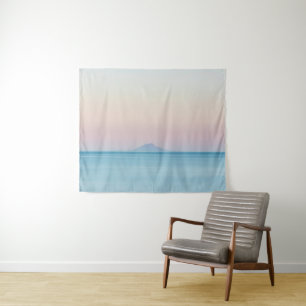 Island silhouette on horizon at sunset tapestry
