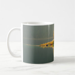 ISLAND SURROUNDED BY WATER COFFEE MUG