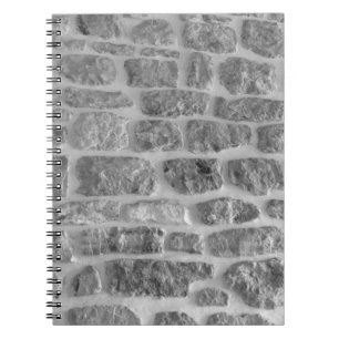 It is horizontal stone rough wall pattern backgrou notebook