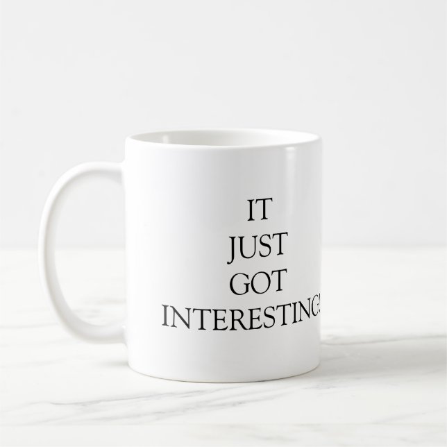 It Just Got Interesting Funny Coffee Mug (Left)