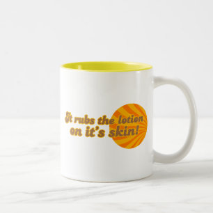 It puts the lotion on its skin Two-Tone coffee mug