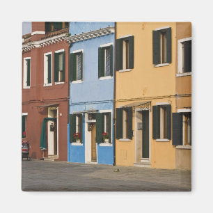 Italy, Burano. Colourful row of homes and empty Magnet