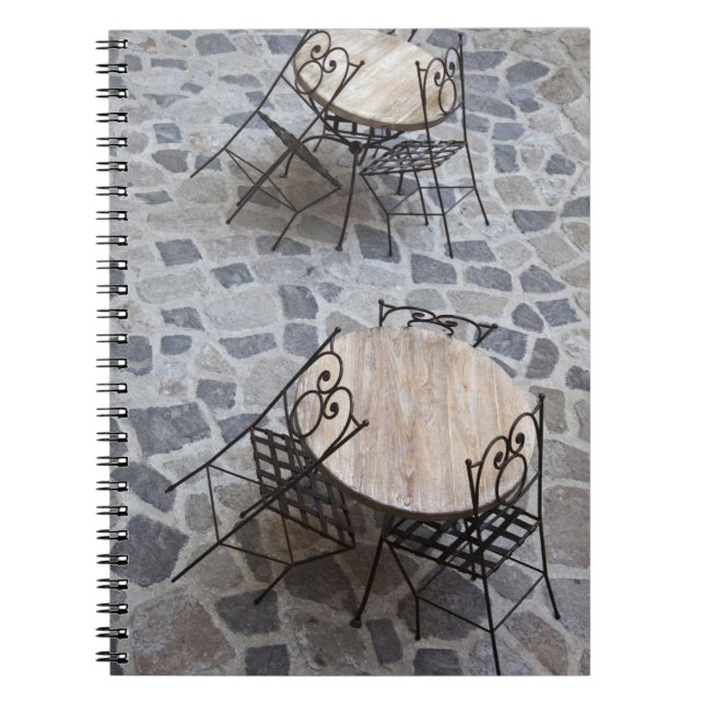 Italy, Sardinia, Castelsardo. Cafe tables. Notebook (Front)