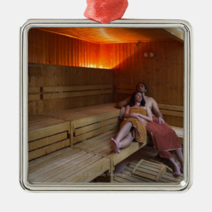Italy, Tuscany, Young couple relaxing in sauna Metal Tree Decoration