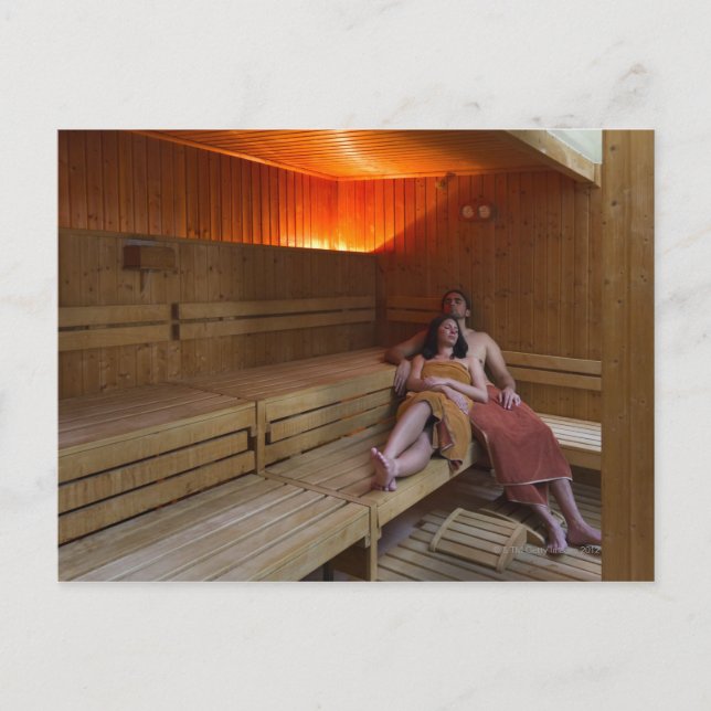 Italy, Tuscany, Young couple relaxing in sauna Postcard (Front)