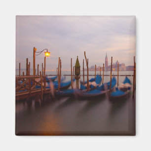 Italy, Venice. Anchored gondolas at twilight. Magnet