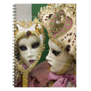 Italy, Venice, Burano Island. Woman dressed in Notebook