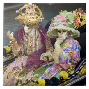 Italy, Venice. Couple dressed in costumes for Ceramic Tile