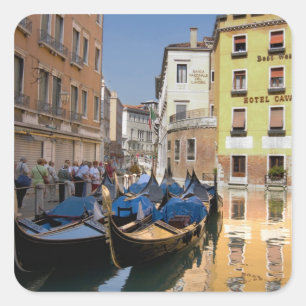 Italy, Venice, gondolas moored along canal Square Sticker