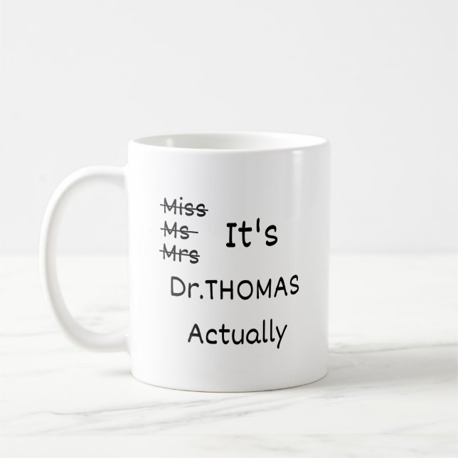 It's Miss Ms Mrs Dr Actually Mug Personalised, PHD (Left)
