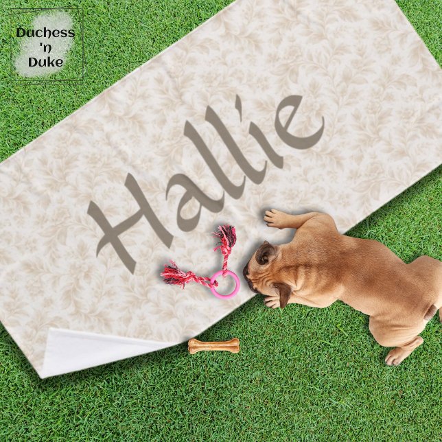 Ivory Botanical Floral Pattern Design Pet Bath Towel (Personalized Dog Towel with ivory botanical design laying on green lawn and small puppy with toys)