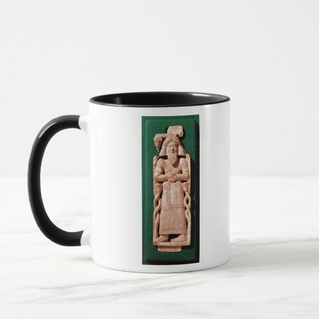 Ivory plaquette of a god mug (Left)