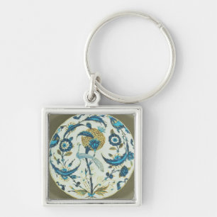 Iznik dish painted with a peacock perched among fl key ring