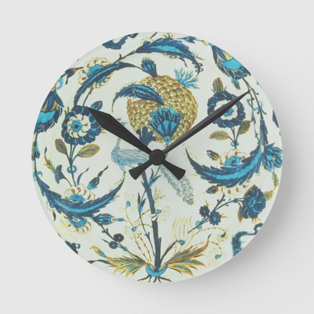 Iznik dish painted with a peacock perched among fl round clock (Front)