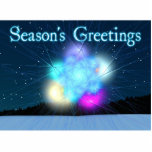 Jack Frost - Season's Greetings Photo Sculpture Magnet<br><div class="desc">A multi-coloured random fractal which resembles Jack Frost ice patterns on a window pane; superimposed on a wintery, night background. The glowing blobs of colour, elements of the original fractal image, are just a nice plus. Text reading "Season's Greetings" appears in glowing blue and white. Those patterns on your windows...</div>