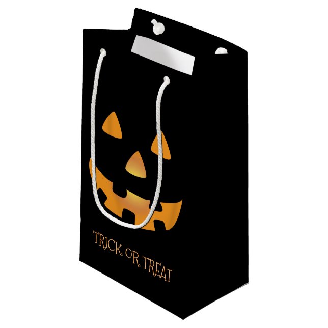 Jack o' lantern face on black background small gift bag (Front Angled)