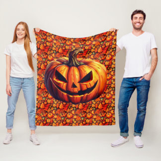 Jack-O-Lantern on Autumn Leaves and Pumpkins Fleece Blanket