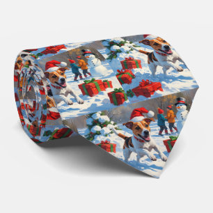 Jack Russell Running in Snow with Christmas Hat Tie
