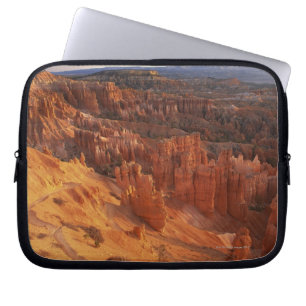 Jagged rock formations in canyon laptop sleeve