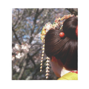 Japan, Kyoto. Rear view close-up of geisha's Notepad