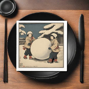 Japanese children rolling large snow ball napkin