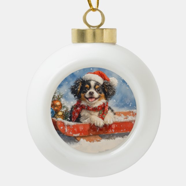 Japanese Chin Dog in Sledge Let it Snow Christmas Ceramic Ball Christmas Ornament (Front)