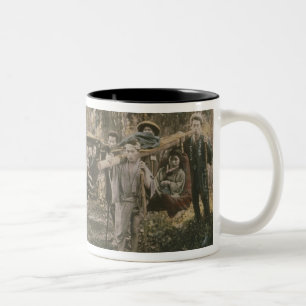 Japanese family being carried in litters, c.1880s Two-Tone coffee mug