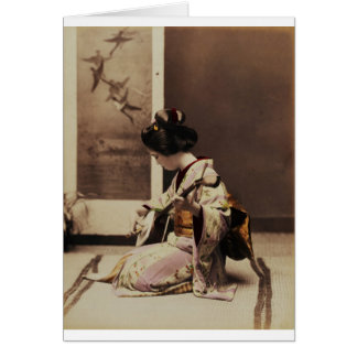 Japanese geisha playing the shamisen
